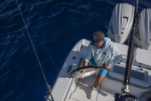 An angler holds his Florida Keys catch.