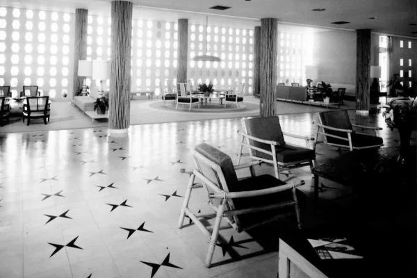 Historic black and white photo of resort lobby