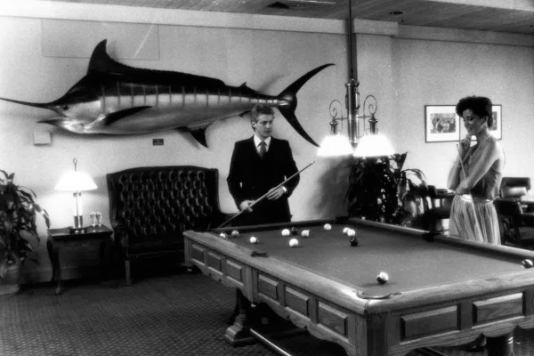 Historic black and white photo of pool table at Hawks Cay