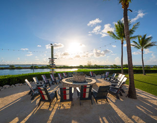 Sit by the fire pit at our award winning hotel in Florida